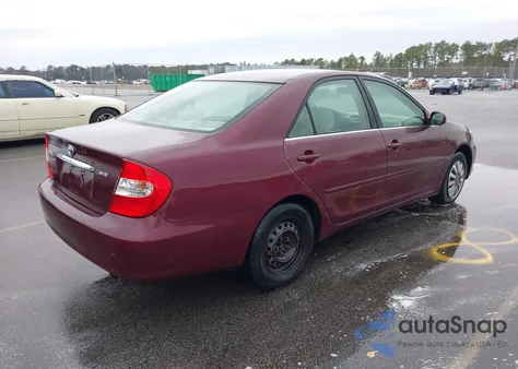 2002 Toyota Camry Le z USA, uszkodzony, nr VIN 4T1BE32K12U527403